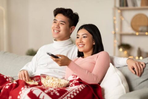 Couple Watching TV in Winter