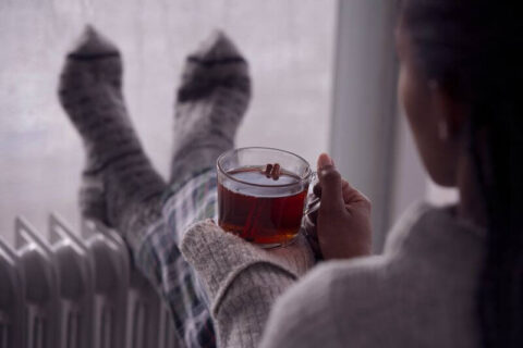 Woman drinking tea in cold season in Utah country