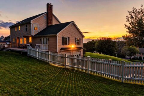 Beautiful colonial house at sunset