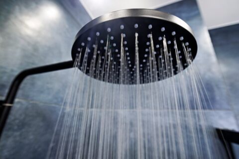 Water running from shower head needing water heater replacement